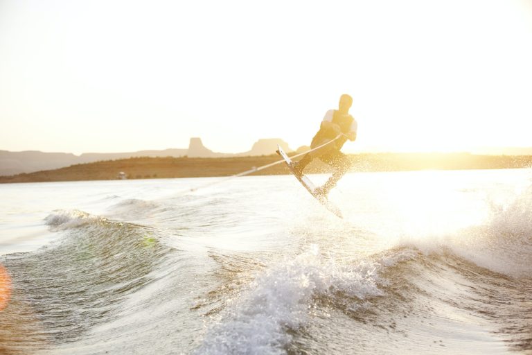 man wake boarding at the lake 768x512